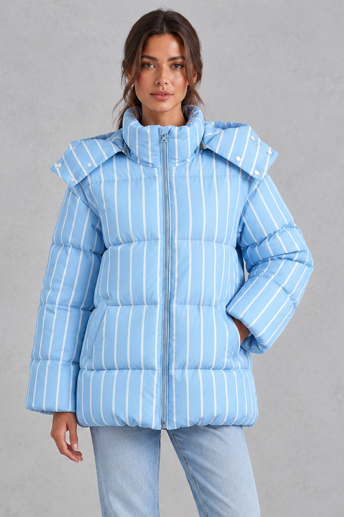 Women’s pink and white striped oversized hooded puffer jacket with horizontal quilting, a high stand collar and voluminous padded silhouette.
