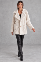 Women's oversized teddy jacket in Cream – full-length view