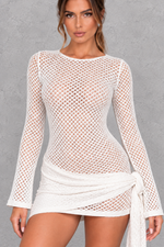 Women’s petite cream knitted mini dress with elegant pleated detailing, a textured finish and feminine silhouette.