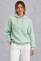 Women's light green plus size cable knit hoodie with drawstring hood – front view
