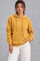 Women's yellow plus size cable knit hoodie with drawstring hood – front view