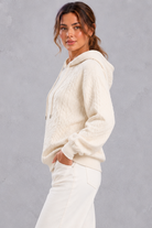 Women's cream plus size cable knit hoodie with drawstring hood – side view