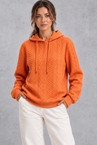 Women's orange plus size cable knit hoodie with drawstring hood – front view