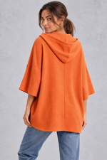Women's plus size orange waffle knit oversized hoodie – back view