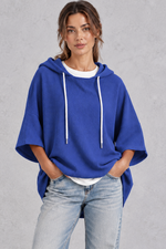 Women's plus size blue waffle knit oversized hoodie with drawstring hood and wide sleeves – front view