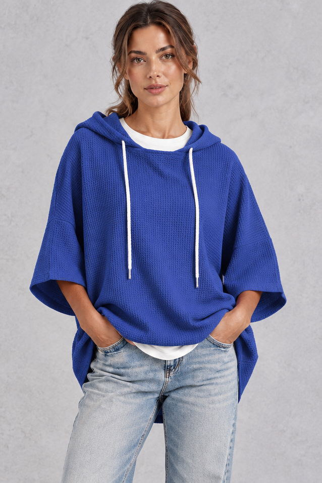 Women's plus size blue waffle knit oversized hoodie with drawstring hood and wide sleeves – front view