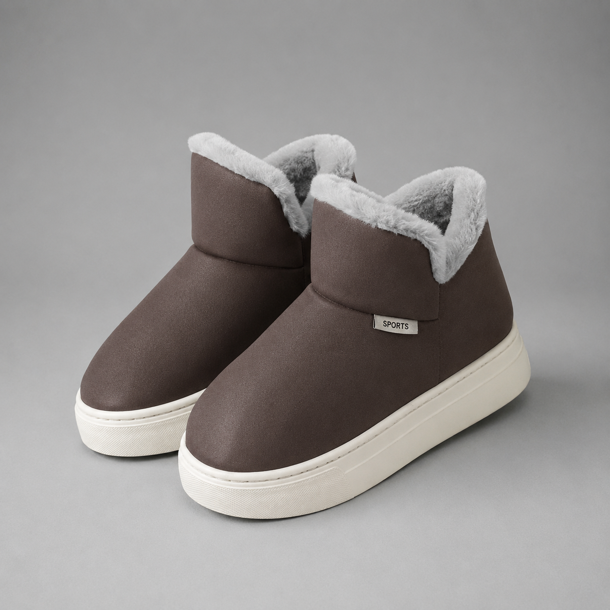 Women's knee-high winter boots with a smooth PU upper, soft plush lining, slip-on design, lightweight wedge heel and non-slip rubber sole, providing warm, comfortable everyday wear for autumn and winter.