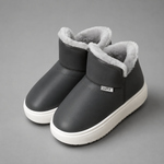 Women's knee-high winter boots with a smooth PU upper, soft plush lining, slip-on design, lightweight wedge heel and non-slip rubber sole, providing warm, comfortable everyday wear for autumn and winter.
