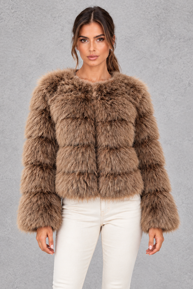 Women’s plush cropped faux fur winter jacket with a rounded neckline, long sleeves and a soft voluminous silhouette.