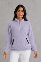 Women’s plush half zip fleece pullover with a high neck, long sleeves, elasticated cuffs and practical front pockets for cosy autumn and winter wear.
