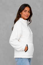 Women’s plush half zip fleece pullover with a high neck, long sleeves, elasticated cuffs and practical front pockets for cosy autumn and winter wear.
