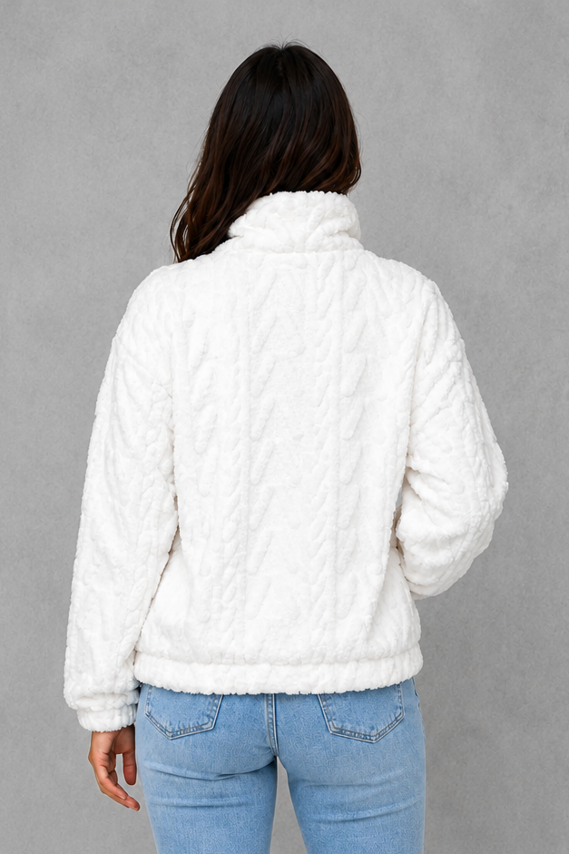 Women’s plush half zip fleece pullover with a high neck, long sleeves, elasticated cuffs and practical front pockets for cosy autumn and winter wear.