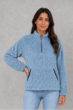 Women’s plush half zip fleece pullover with a high neck, long sleeves, elasticated cuffs and practical front pockets for cosy autumn and winter wear.