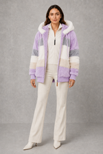 Women’s plush hooded winter coat with soft faux fur panels, a relaxed silhouette and rib-knit cuffs for cosy cold-weather layering.