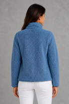 Women’s plush sherpa jacket with a soft textured finish, relaxed flattering silhouette and cosy construction for everyday cold-weather layering.
