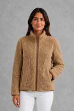 Women’s plush sherpa jacket with a soft textured finish, relaxed flattering silhouette and cosy construction for everyday cold-weather layering.