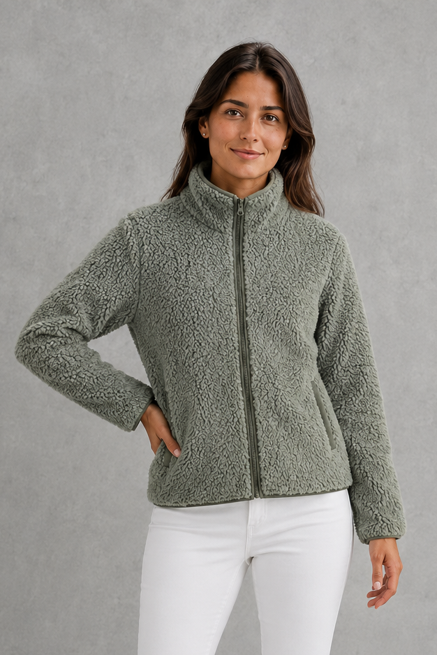 Women’s plush sherpa jacket with a soft textured finish, relaxed flattering silhouette and cosy construction for everyday cold-weather layering.