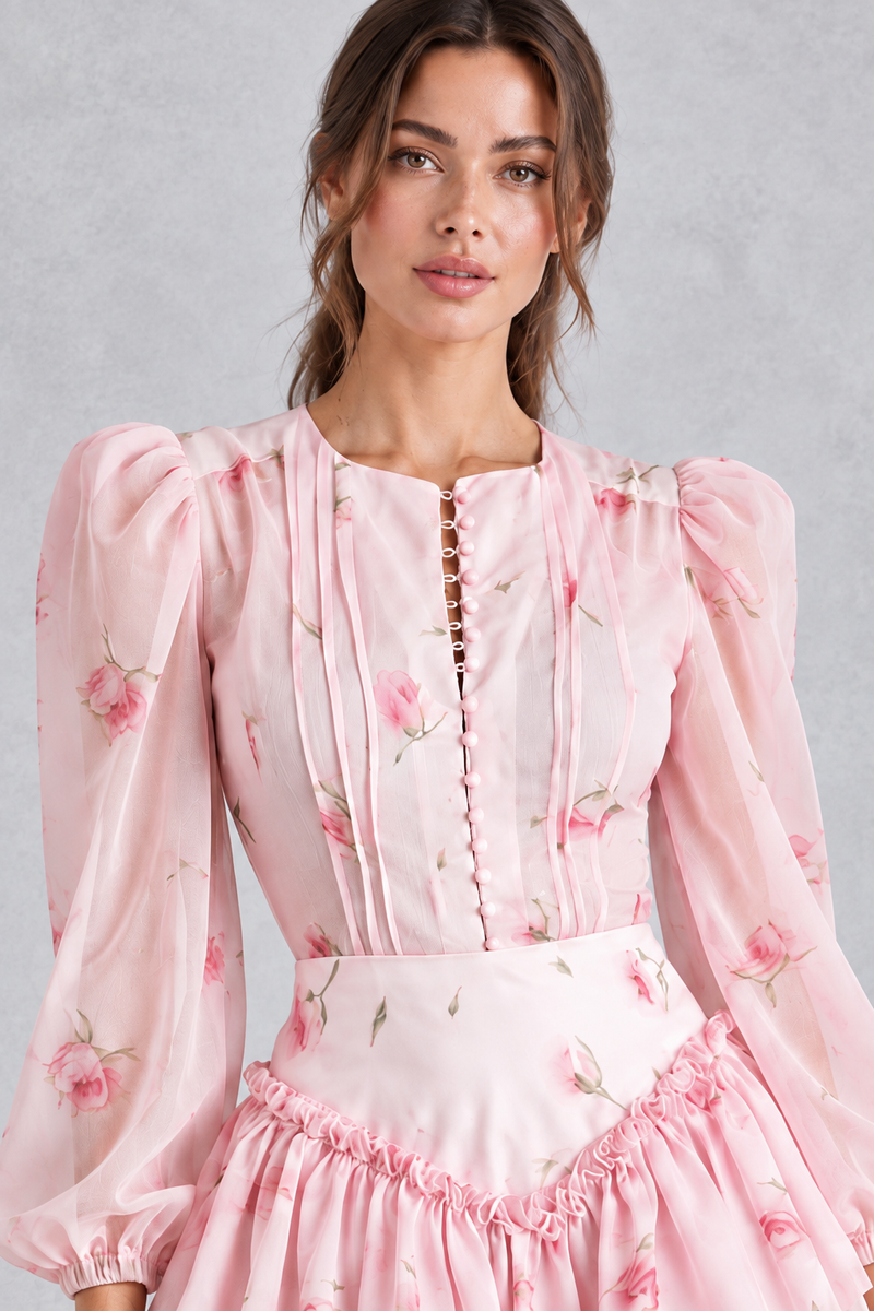 Women’s printed ruffle mini dress with long lantern sleeves, structured shoulders, cascading ruffle detailing and a defined waist.