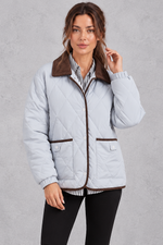 Women's ice blue diamond quilted jacket with brown cord collar and trim – front view