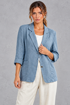 Women's relaxed-fit blazer in Light Blue – front view