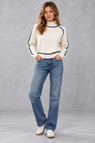 Women's Relaxed-Fit Turtleneck Jumper in Cream – full-length view