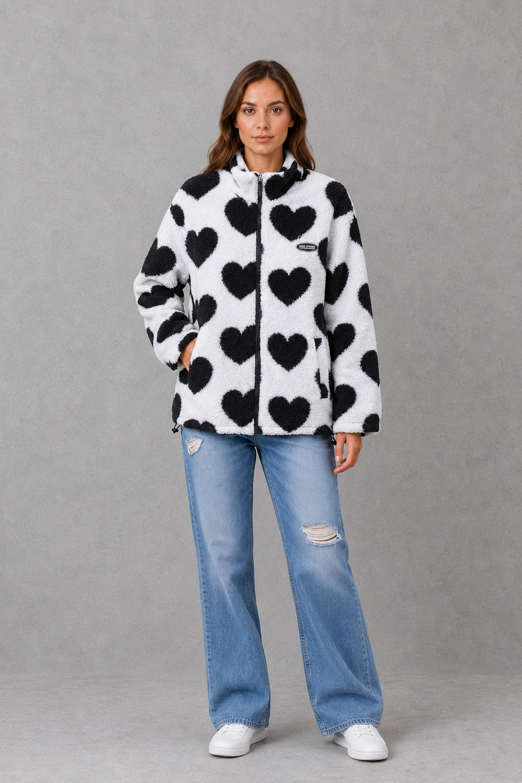 Women’s reversible lightweight jacket with a heart-inspired pattern, soft-touch finish and flattering casual silhouette for everyday layering.