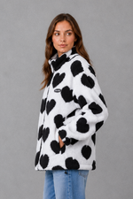 Women’s reversible lightweight jacket with a heart-inspired pattern, soft-touch finish and flattering casual silhouette for everyday layering.