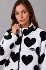 Women’s reversible lightweight jacket with a heart-inspired pattern, soft-touch finish and flattering casual silhouette for everyday layering.