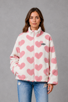 Women’s reversible lightweight jacket with a heart-inspired pattern, soft-touch finish and flattering casual silhouette for everyday layering.