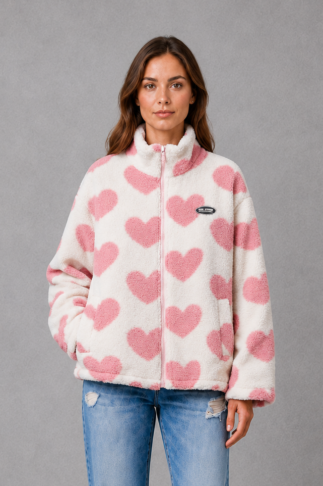 Women’s reversible lightweight jacket with a heart-inspired pattern, soft-touch finish and flattering casual silhouette for everyday layering.