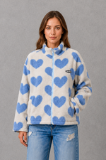 Women’s reversible lightweight jacket with a heart-inspired pattern, soft-touch finish and flattering casual silhouette for everyday layering.