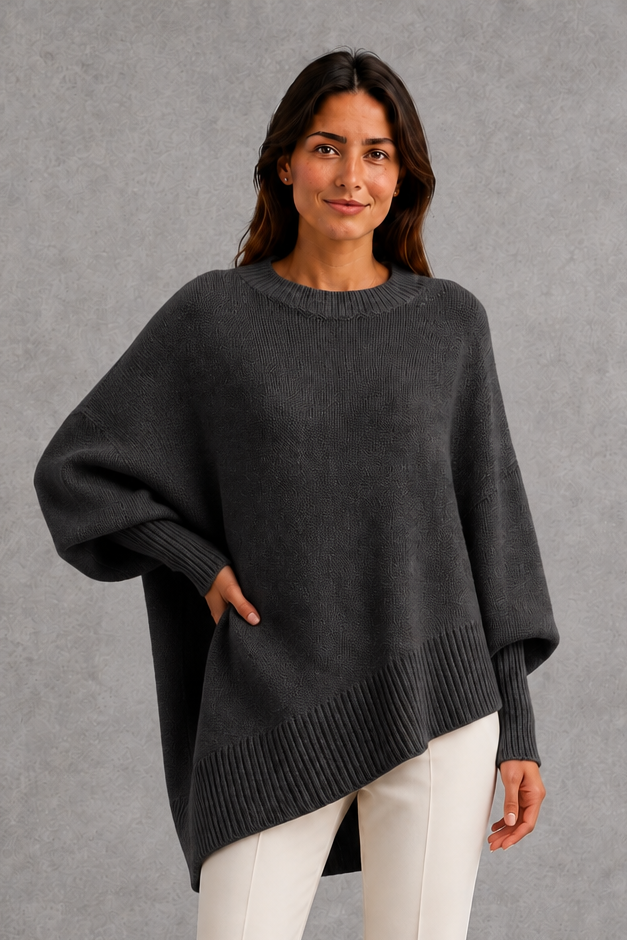 Women’s ribbed high neck knit jumper with long sleeves and a relaxed, softly draped silhouette for autumn and winter wear.