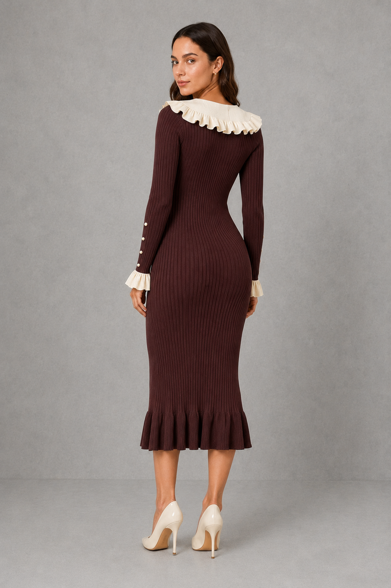 Women’s ribbed knit midi dress with a statement ruffle collar, decorative front buttons, fitted silhouette, long sleeves and flared ruffle cuffs.