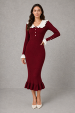 Women’s ribbed knit midi dress with a statement ruffle collar, decorative front buttons, fitted silhouette, long sleeves and flared ruffle cuffs.