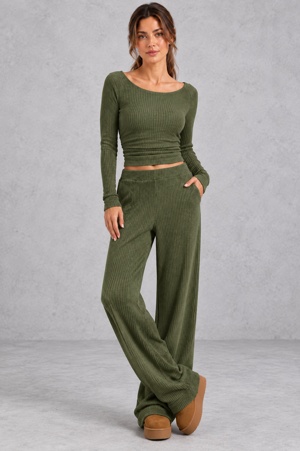 Women's green ribbed knit co-ord set with crop top and wide leg trousers with pockets – front view
