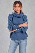 Women's blue ribbed cowl neck jumper – front view