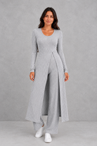 Women’s ribbed two piece lounge set with a fitted long-sleeve top, flowing split longline overlay and matching high-waisted leggings.