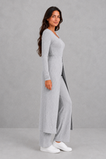Women’s ribbed two piece lounge set with a fitted long-sleeve top, flowing split longline overlay and matching high-waisted leggings.