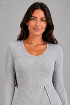 Women’s ribbed two piece lounge set with a fitted long-sleeve top, flowing split longline overlay and matching high-waisted leggings.
