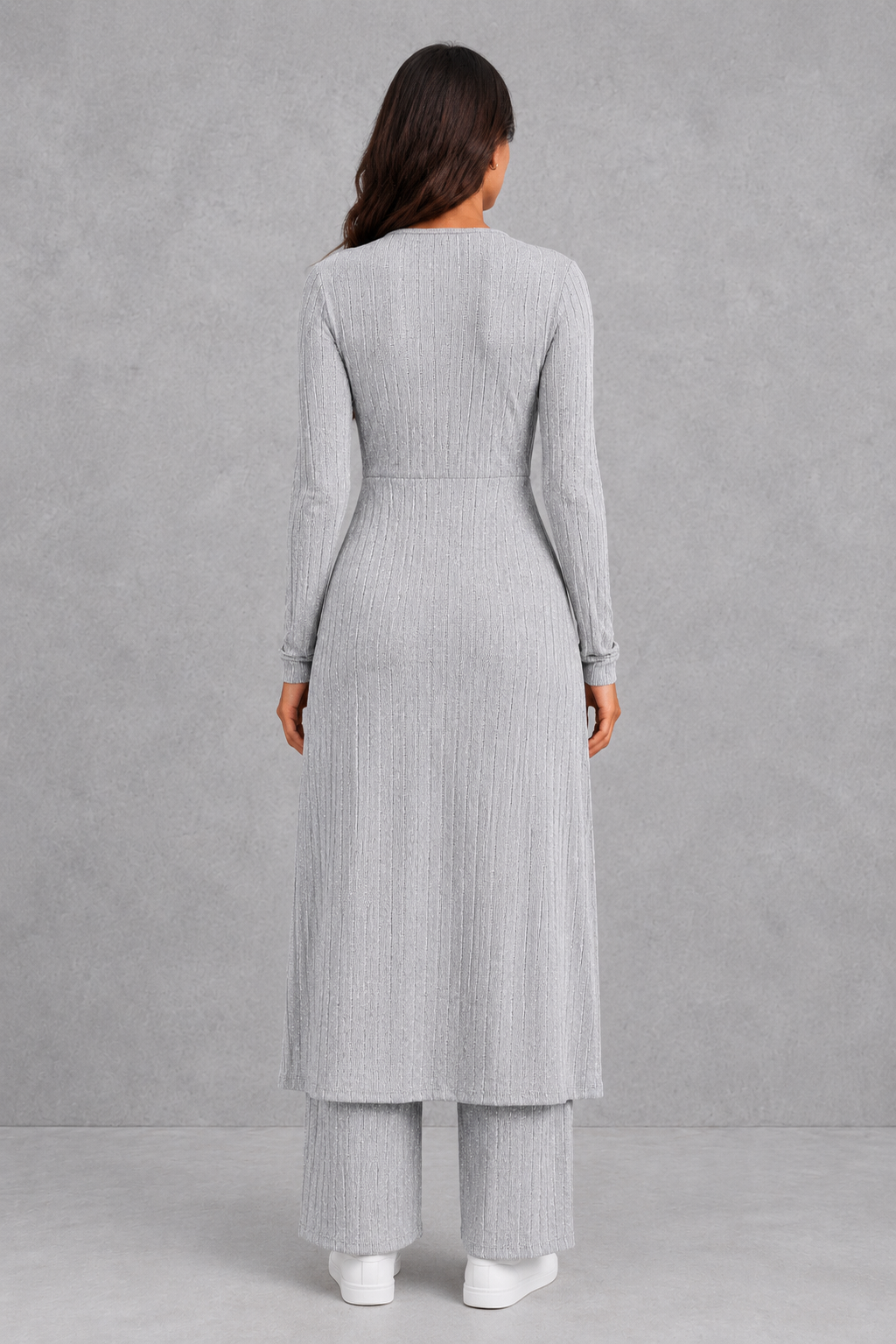 Women’s ribbed two piece lounge set with a fitted long-sleeve top, flowing split longline overlay and matching high-waisted leggings.