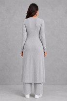 Women’s ribbed two piece lounge set with a fitted long-sleeve top, flowing split longline overlay and matching high-waisted leggings.