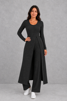 Women’s ribbed two piece lounge set with a fitted long-sleeve top, flowing split longline overlay and matching high-waisted leggings.