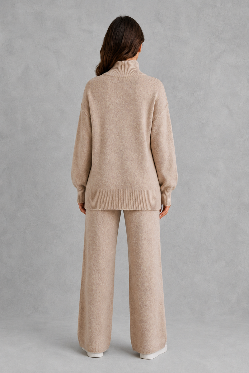 Women’s roll neck knit jumper and wide leg trouser set with an oversized silhouette, dropped shoulders and matching full-length knitted trousers.