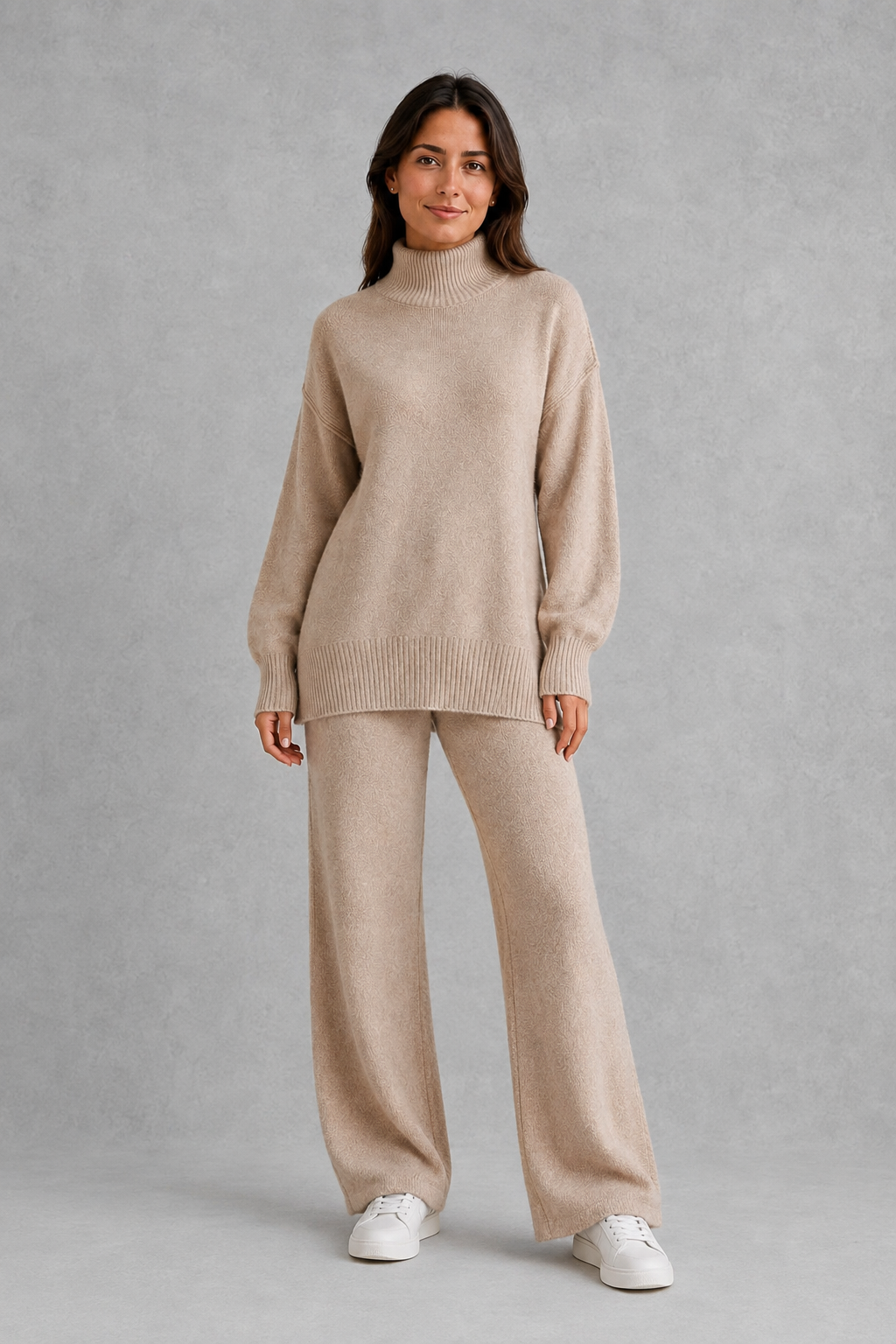 Women’s roll neck knit jumper and wide leg trouser set with an oversized silhouette, dropped shoulders and matching full-length knitted trousers.