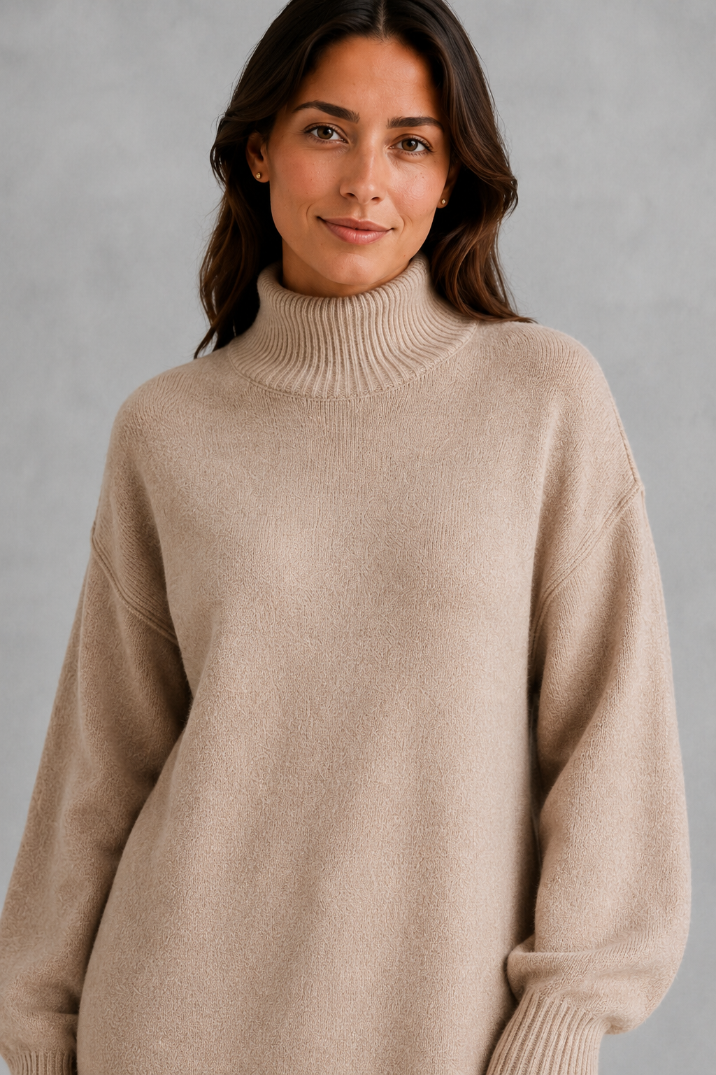 Women’s roll neck knit jumper and wide leg trouser set with an oversized silhouette, dropped shoulders and matching full-length knitted trousers.