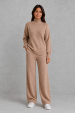 Women’s roll neck knit jumper and wide leg trouser set with an oversized silhouette, dropped shoulders and matching full-length knitted trousers.
