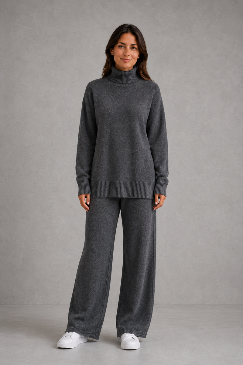 Women’s roll neck knit jumper and wide leg trouser set with an oversized silhouette, dropped shoulders and matching full-length knitted trousers.