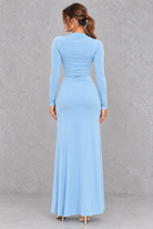 Women’s ruched long sleeve maxi party dress with a sleek bodycon silhouette, textured detailing and elegant floor-length design.