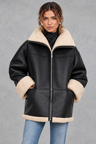 Women's shearling-lined faux leather coat in Black – front view