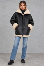 Women's shearling-lined faux leather coat in Black – full-length view